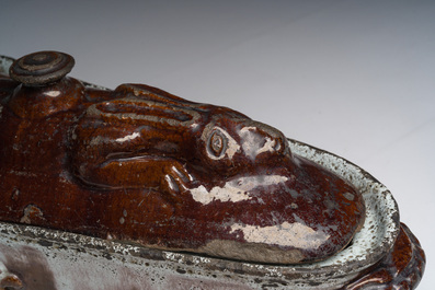 A brown-glazed pottery tureen for hare's p&acirc;t&eacute;, west of France, 19th C.