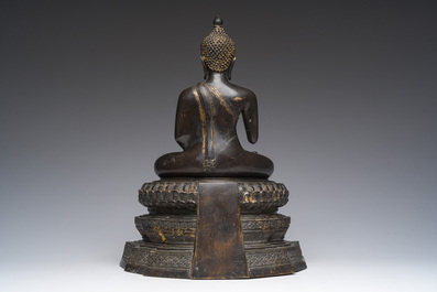 A Thai bronze sculpture of the seated Buddha with traces of gilding, Rattanakosin, 18th/19th C.