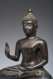 A Thai bronze sculpture of the seated Buddha with traces of gilding, Rattanakosin, 18th/19th C.