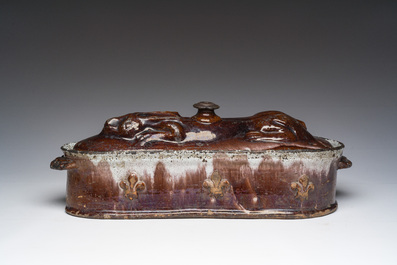 A brown-glazed pottery tureen for hare's p&acirc;t&eacute;, west of France, 19th C.