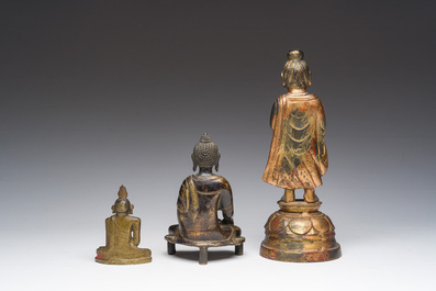 Three gilt-lacquered bronze Buddha sculptures, Corea, Tibet and Sri Lanka, 19th C.