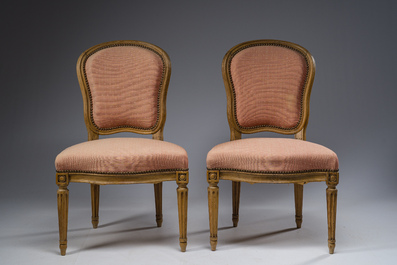 A pair of French Transition carved beechwooden chairs with old pink upholstery, 18th C.