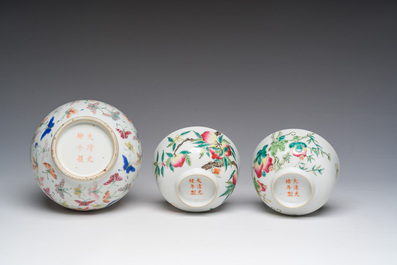 A Chinese famille rose '100 butterflies' vase and two bowls with peaches and balsam pears, Qianlong mark, 20th C.