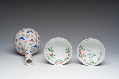 A Chinese famille rose '100 butterflies' vase and two bowls with peaches and balsam pears, Qianlong mark, 20th C.