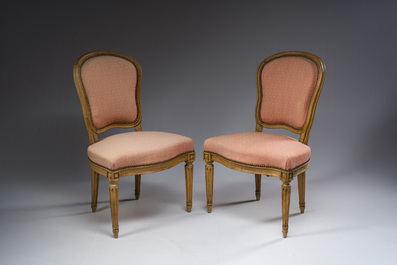 A pair of French Transition carved beechwooden chairs with old pink upholstery, 18th C.