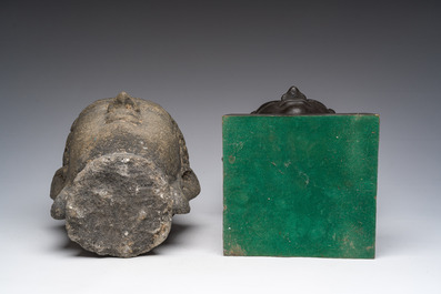 A Thai bronze Buddha head and a Chinese stone Buddha head, 19th/20th C.