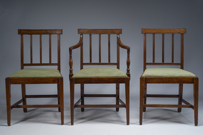 A set of six English mahogany chairs and two armchairs upholstered in green fabric, 19th C.