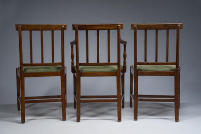 A set of six English mahogany chairs and two armchairs upholstered in green fabric, 19th C.
