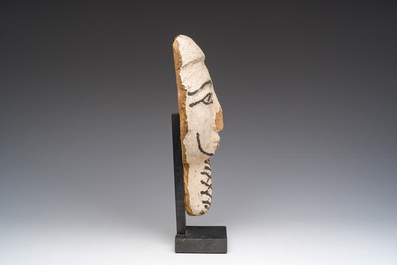 An Egyptian wooden sarcophagus mask with white stucco and black accents, Late Period, 6th-1st C. b.C.
