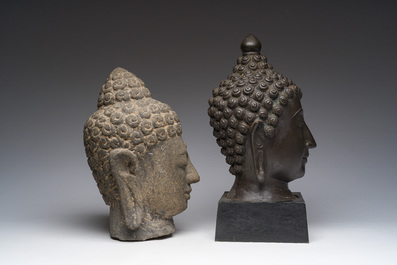 A Thai bronze Buddha head and a Chinese stone Buddha head, 19th/20th C.