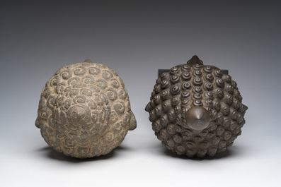 A Thai bronze Buddha head and a Chinese stone Buddha head, 19th/20th C.