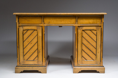 An English nine-drawers wooden pedestal desk with ebonized wooden inlay and leather top, Garnett &amp; Sons, ca. 1900