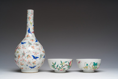 A Chinese famille rose '100 butterflies' vase and two bowls with peaches and balsam pears, Qianlong mark, 20th C.