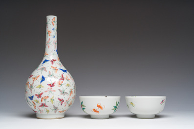 A Chinese famille rose '100 butterflies' vase and two bowls with peaches and balsam pears, Qianlong mark, 20th C.