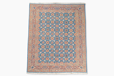 A Persian Varamin rug with floral design, wool on cotton, 20th C.