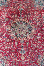 A Persian Keshan (Kashan) rug with floral design, wool on cotton, 20th C.