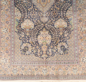 A Persian Kashmir rug with floral design, wool on cotton, 20th C.