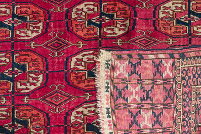 Two Persian and one Afghan rug with geometric design, wool on cotton, 20th C.
