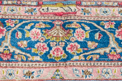 A Persian Kerman (Kirman) rug with floral design, wool on cotton, 20th C.