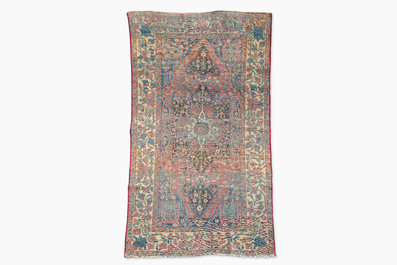 A Persian Bakhtiar rug with floral design, wool on cotton, 20th C.