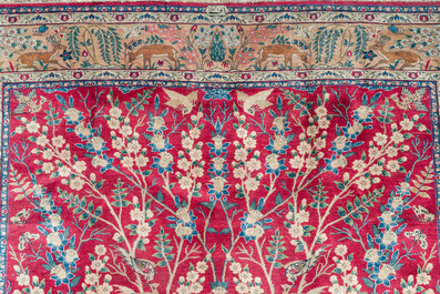 A Persian Tabriz 'tree of life' rug, wool on cotton, mid 20th C.