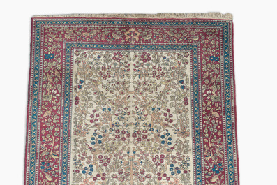 A Turkish 'tree of life' rug, wool on cotton, 20th C.