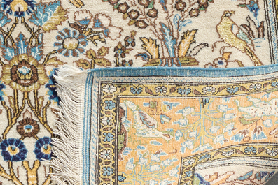 A Persian Qom (Qum/Ghom) rug with floral design, silk on cotton, 20th C.