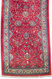 A Persian Saroukh runner with floral design, wool on cotton, 20th C.