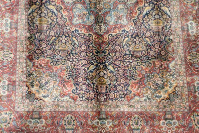 A presumably Indian Qom (Qum/Ghom) rug with floral design, wool on cotton, 20th C.