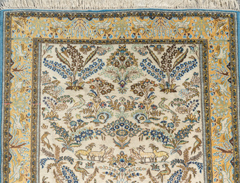 A Persian Qom (Qum/Ghom) rug with floral design, silk on cotton, 20th C.