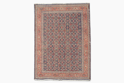A Persian Tabriz rug with floral design, wool on cotton, 20th C.