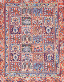 Two Persian Bakhtiar rugs with floral design, wool on cotton, 20th C.