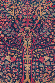 A pair of Persian Kerman (Kirman) rugs with floral design, wool on cotton, 20th C.