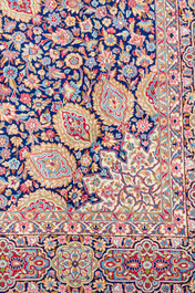 A Persian Kerman (Kirman) rug with floral design, wool on cotton, 20th C.