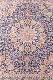 A Persian Kerman (Kirman) rug with floral design, wool on cotton, 20th C.