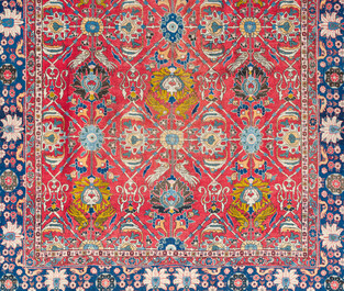A Persian Varamin rug with floral design, wool on cotton, 20th C.