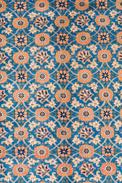 A Persian Varamin rug with floral design, wool on cotton, 20th C.