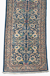 A Persian Nahavand 'single nod' runner with floral design, wool on cotton, 20th C.