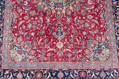A Persian Keshan (Kashan) rug with floral design, wool on cotton, 20th C.