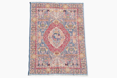 Een Perzisch Kashmar tapijt met antiquiteiten en floraal decor, gesigneerd Taji, wol op katoen, 20ste eeuw
