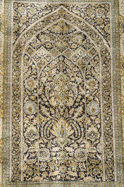 A Persian Qom (Qum/Ghom) silk rug with floral design and calligraphy, Mahneb, third quarter 20th C.