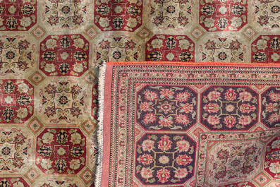 A Persian Qom (Qum/Ghom) silk rug with floral design, 20th C.