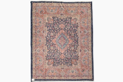 A Persian Kashmar rug with floral design, wool on cotton, 20th C.