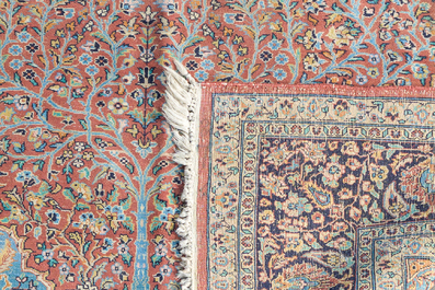 A Persian 'tree of life' Kashmir rug, wool on cotton, first half 20th C.