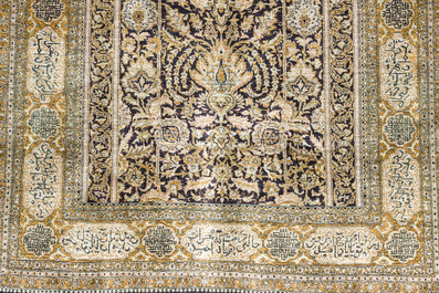 A Persian Qom (Qum/Ghom) silk rug with floral design and calligraphy, Mahneb, third quarter 20th C.