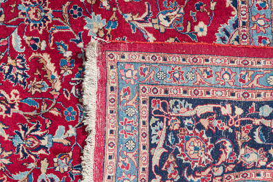A Persian Keshan (Kashan) rug with floral design, wool on cotton, 20th C.