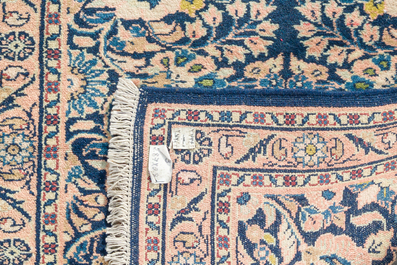 A Persian Nahavand 'single nod' runner with floral design, wool on cotton, 20th C.