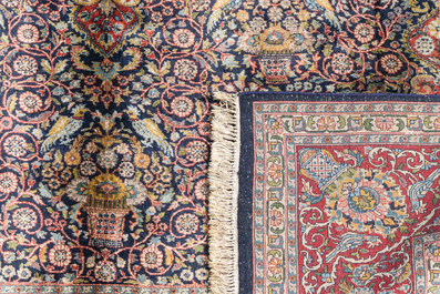 A presumably Indian Qom (Qum/Ghom) rug with floral design, wool on cotton, 20th C.