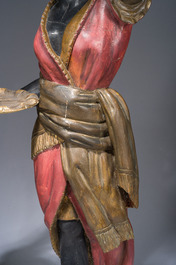 Grande paire de torch&egrave;res dites 'Aux Maures' &agrave; cinq lumi&egrave;res en bois sculpt&eacute; et polychrom&eacute;, Italie, Venise, vers 1900