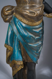 Grande paire de torch&egrave;res dites 'Aux Maures' &agrave; cinq lumi&egrave;res en bois sculpt&eacute; et polychrom&eacute;, Italie, Venise, vers 1900